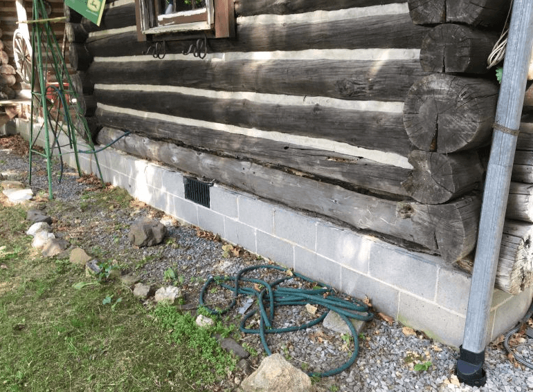 How Do You Repair or Replace Damaged Logs or Wooden Beams in a Cottage?